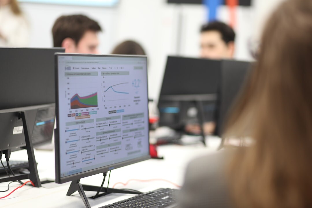 data analyst reviewing charts