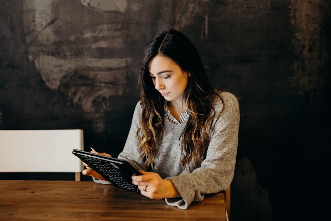 woman reviewing marketing metrics